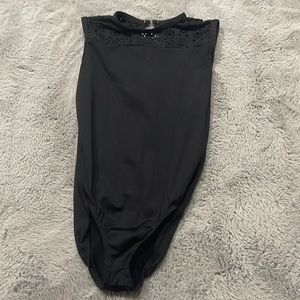 Black leotard with cut out design on chest